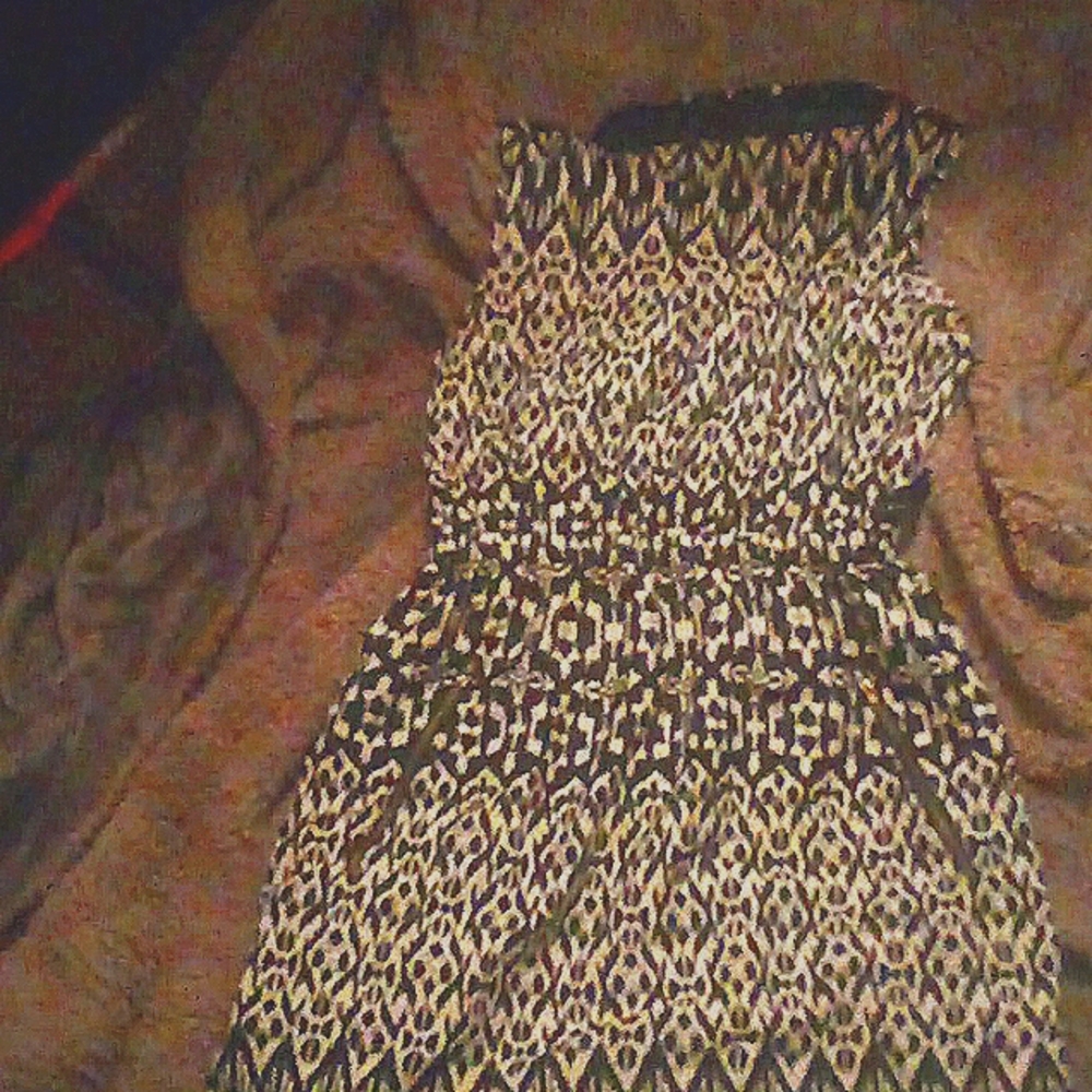 Black & white sleeveless mini dress with zipper pockets